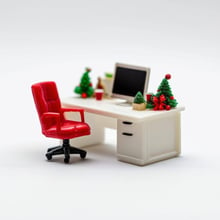 miniature plastic of a clean empty desk with an office chair behind it