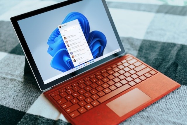 red surface laptop