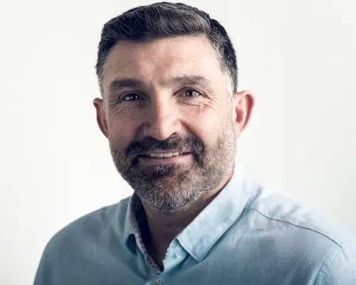 A headshot photograph of Robert Buchanan